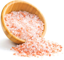 Image of Gourmet Himalayan Salt - Medium grain crystals pouring from a wooden bowl