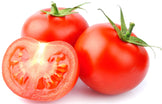 Image of Tomato sliced and 2 other tomatoes on white background