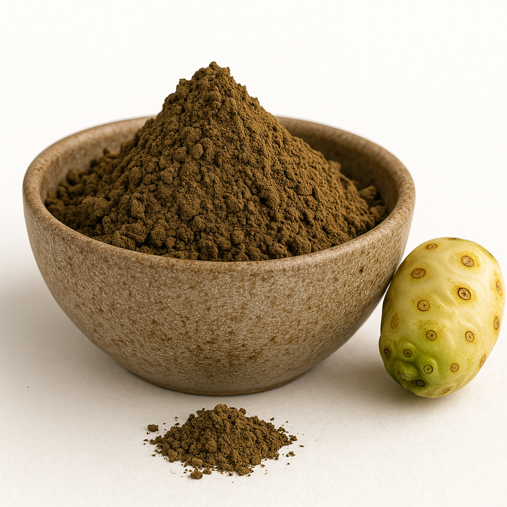 A bowl of organic noni fruit powder with a small pile of powder in front and a whole noni fruit beside it on a white background.