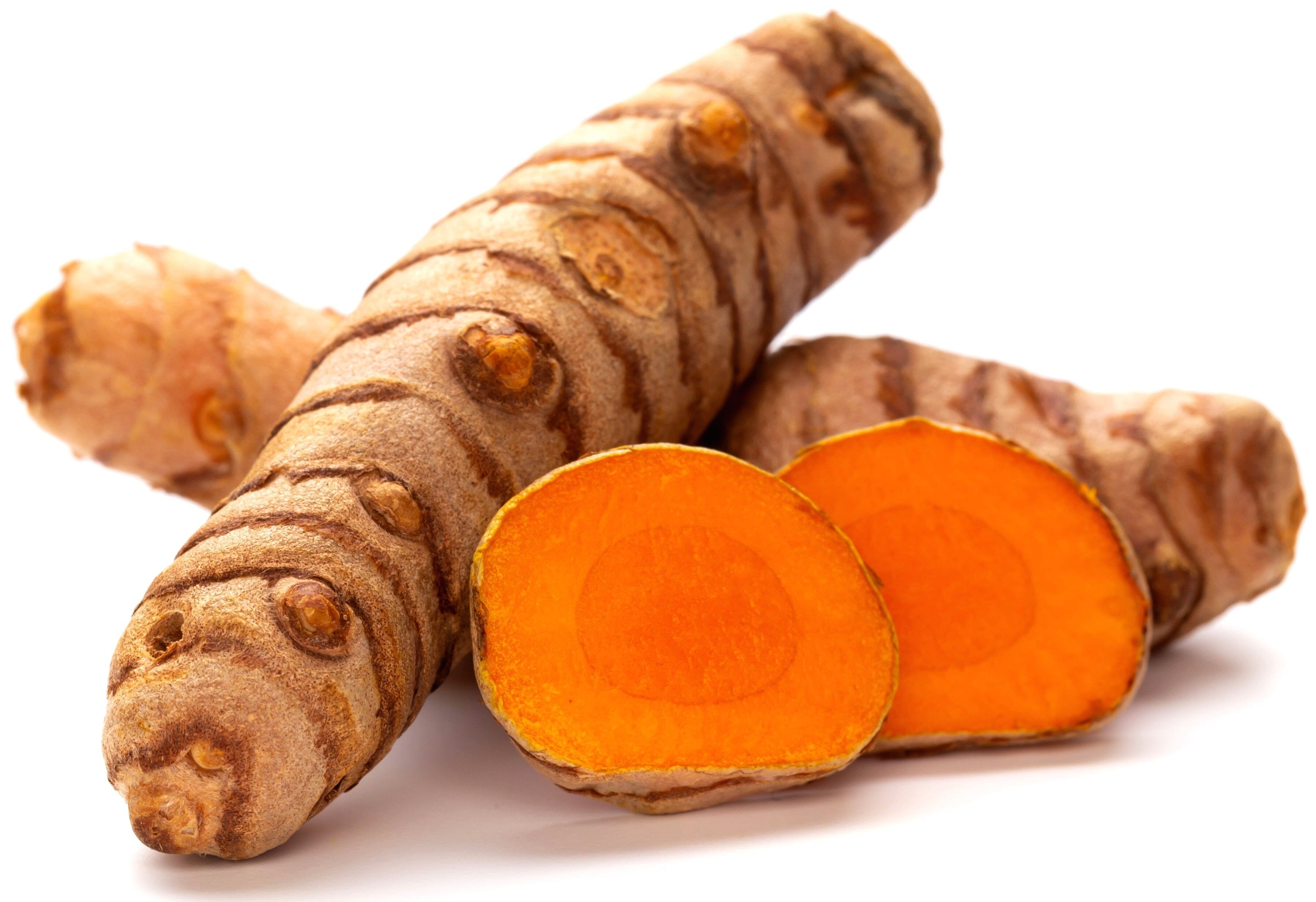 Image of Turmeric Roots and slices which are orange in color