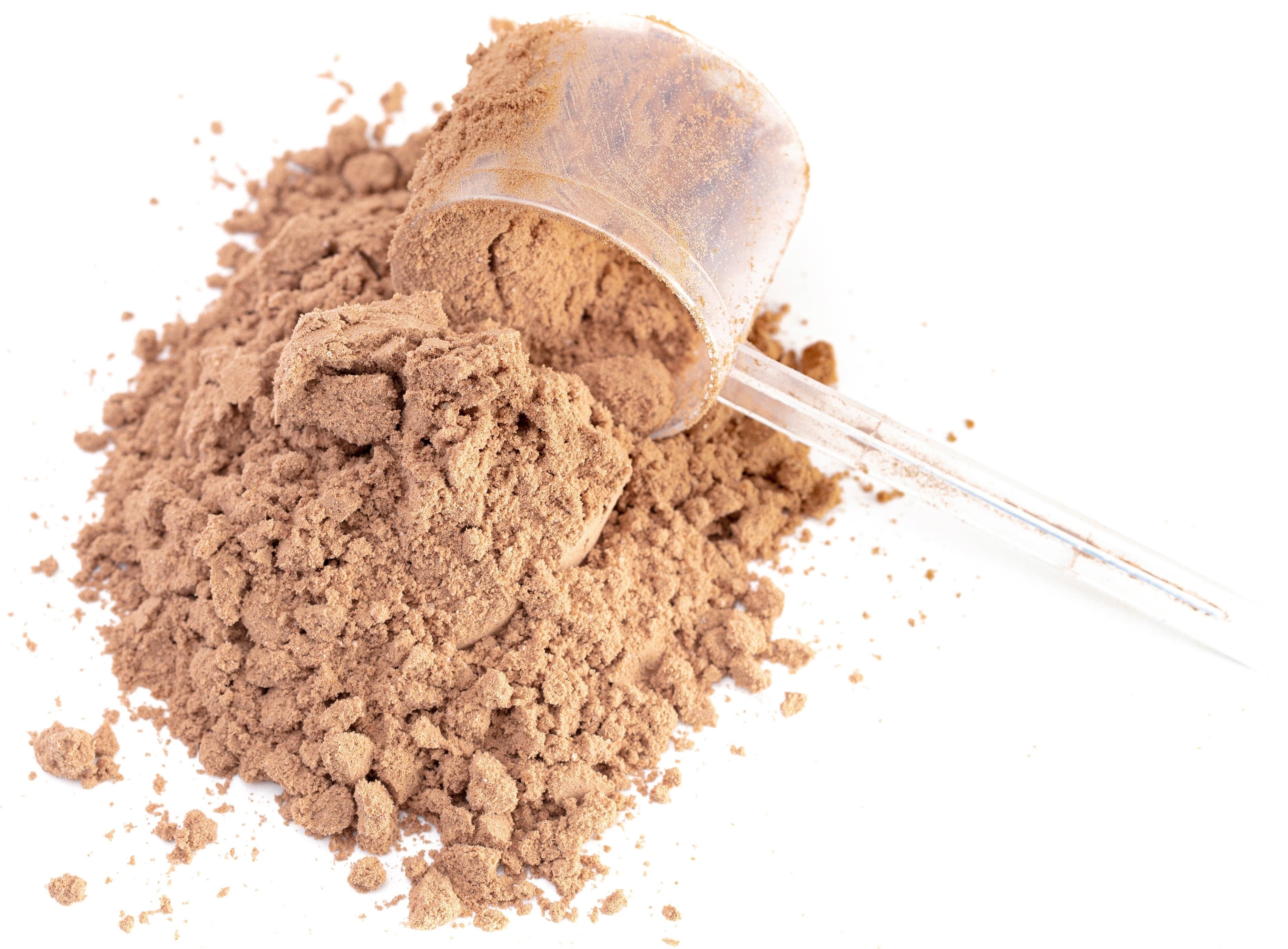 Pile of Organic 7 Mushrooms Blend Mushroom Powder with plastic scoop on white background.