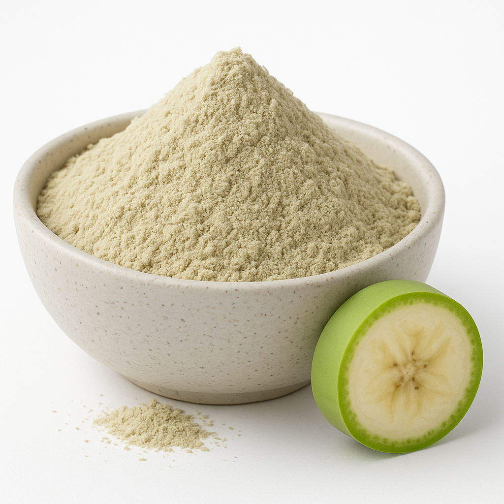 Organic green banana powder mounded in a neutral speckled bowl on a white background.