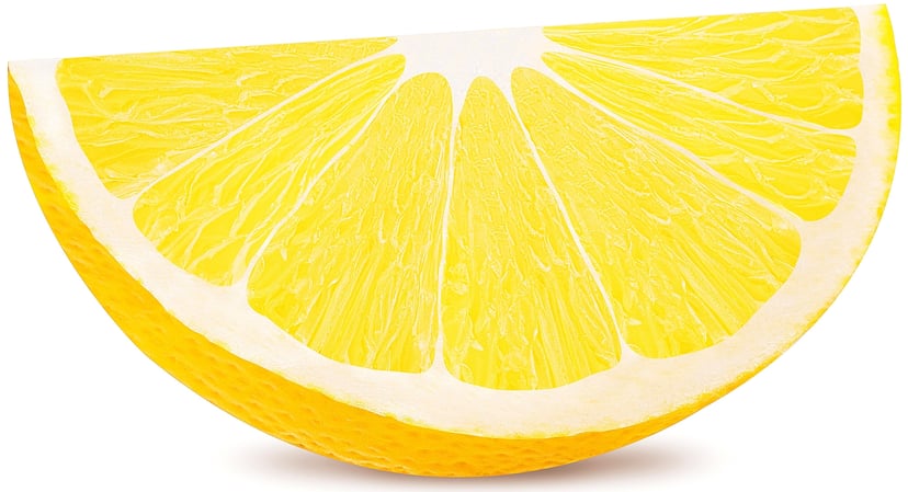 Closeup image of quartered Lemon slice on white background