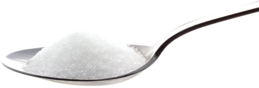 Photo of metal spoon full of Stevia & Erythritol Blend that looks very close to regular white sugar crystals