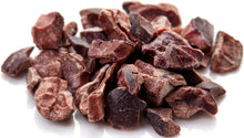 Closeup image of Cacao Nibs on white background