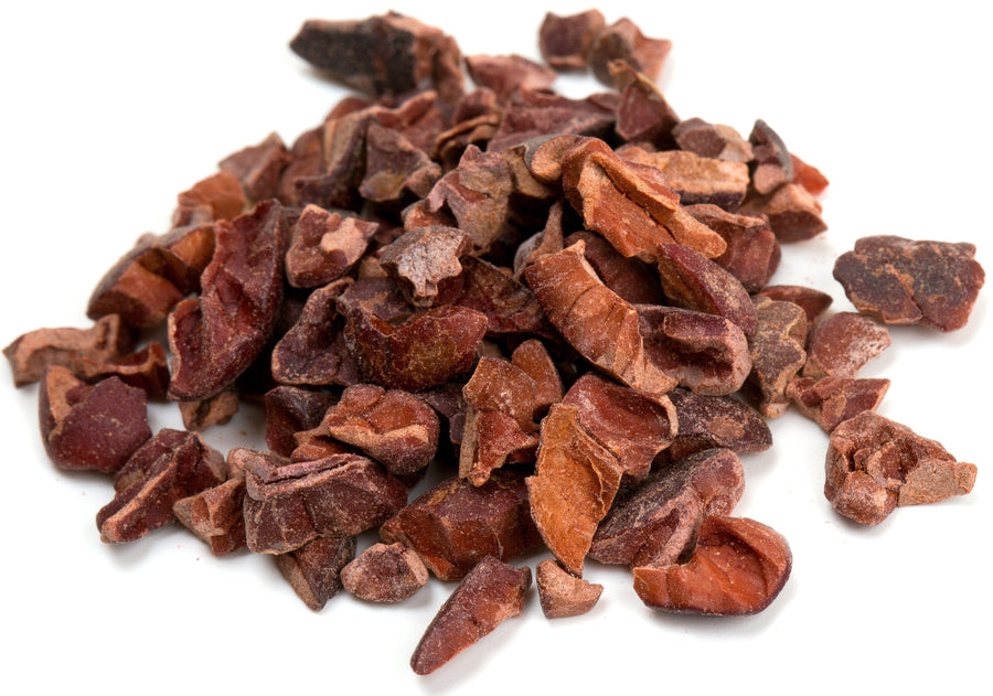 Closeup image of Cacao Nibs on white background