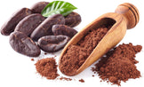 Cacao Powder with beans and wooden spoon on white background