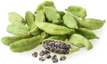 Image of several green Cardamom Seed pods with one pod in front peeled back to exposing the seeds inside.