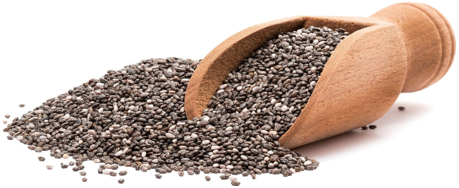 Chia Seeds in a pile on white background with a wooden scoop