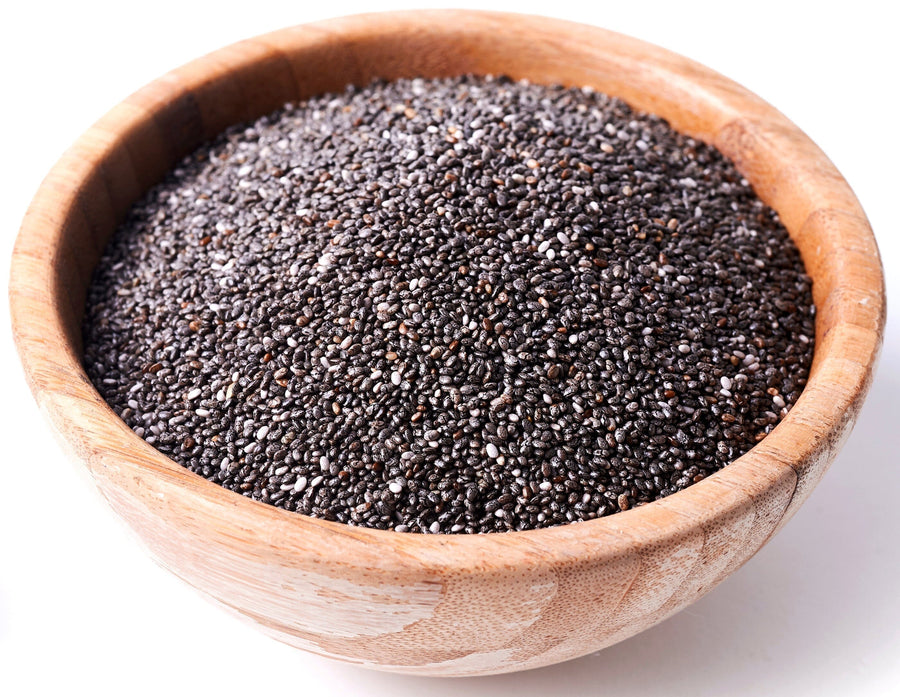 Chia Seeds in a wooden bowl on white background