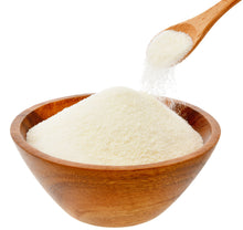 Image of Collagen MCT Creamer (Unflavored) powder on a wooden bowl with a wooden spoon