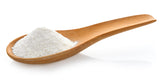 Image of Creamy Vanilla Cashew Milk Powder in a wooden spoon on white background