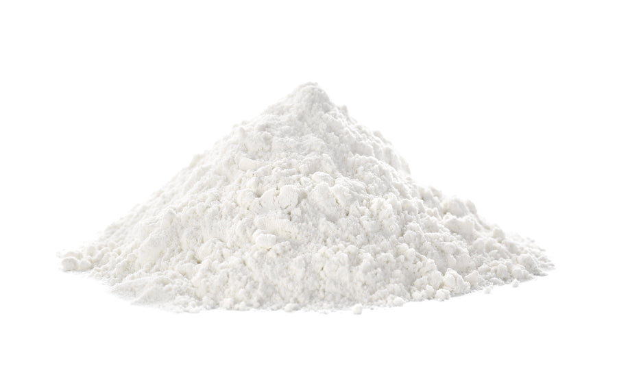Photo of pile of Creamy Vanilla Cashew Milk Powder on white background