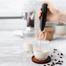 Image of frother mixing milk
