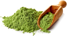 Image of Green Power - Organic SuperGreens Blend powder from Z Natural Foods in a pile with a wooden scoop
