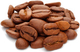Close picture of a pile of roasted brown coffee beans - Z Natural Foods