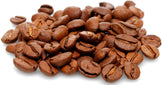 Photo of many dark brown roasted coffee beans - Z Natural Foods
