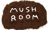 Image of ground coffee with the word Mushroom spelled out
