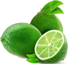 Image of 2 whole limes and half a lime with some leaves