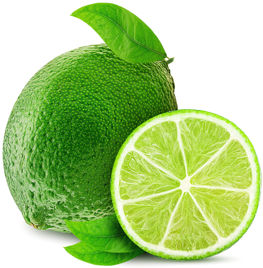 Image of a whole lime with some leaves and a slice of lime