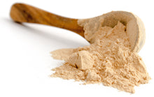 A pile of Lucuma Powder with a wooden spoon on white background