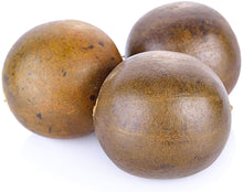 Image of 3 brown Luo Han Guo fruits