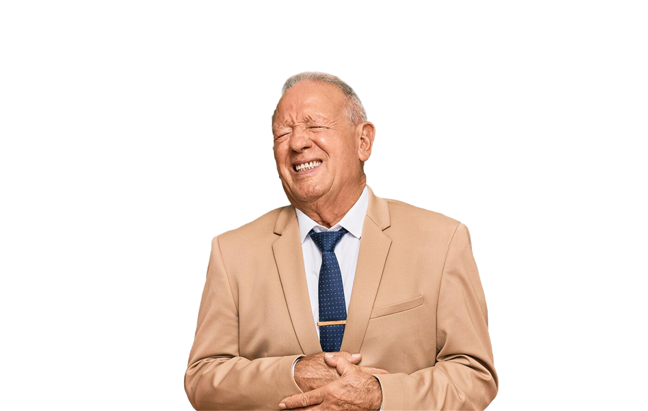 Image of older man in tan jacket and tie holding his stomach because of nausea.