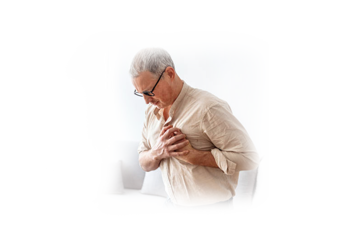 Image of man holding his chest with both hands suffering from heartburn after eating a lot of spicy food.