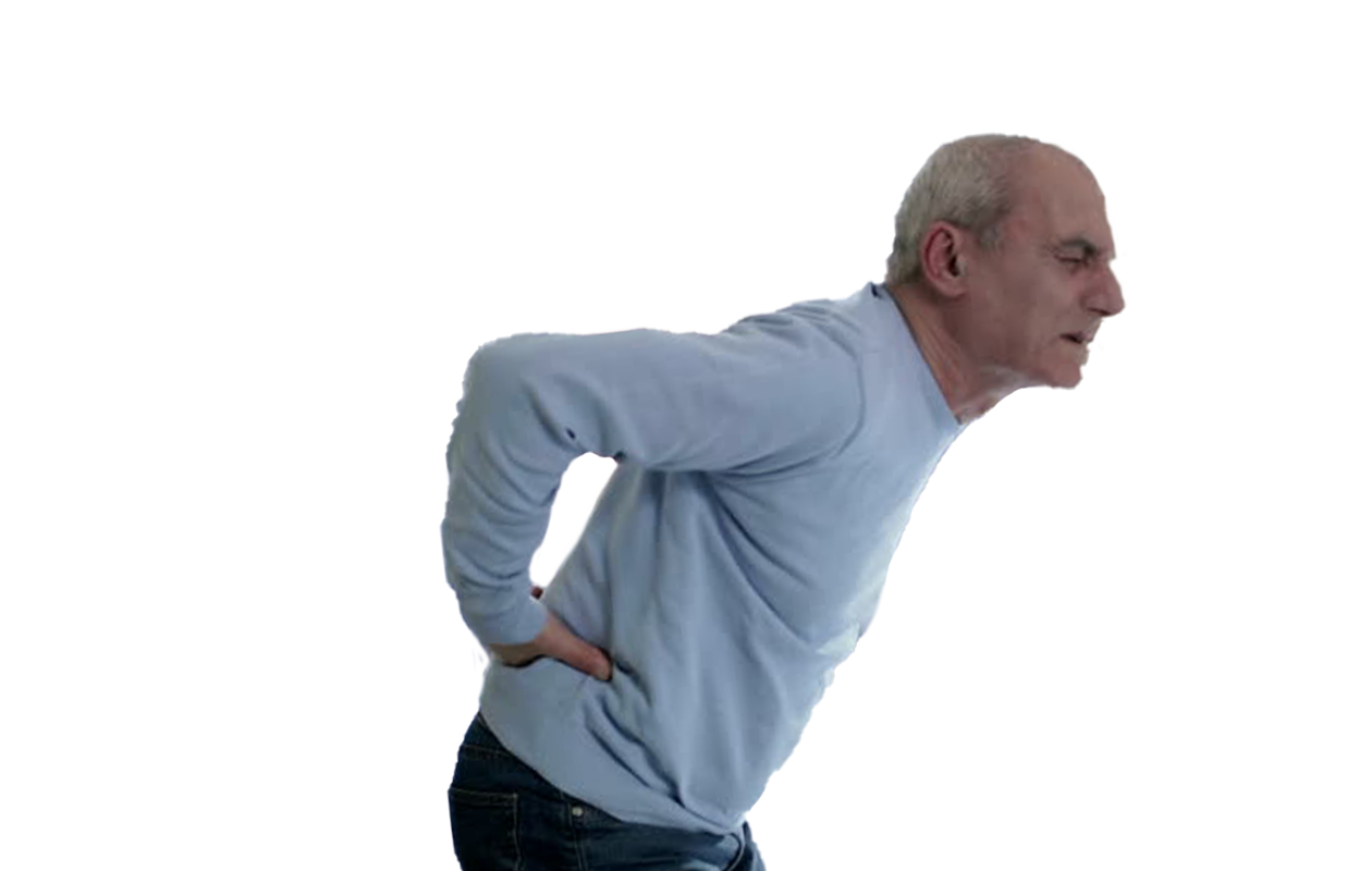 Photo of man bending over holding lower back because of muscle soreness
