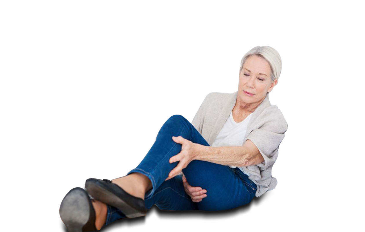 Woman sitting and holding leg because of restless legs syndrome