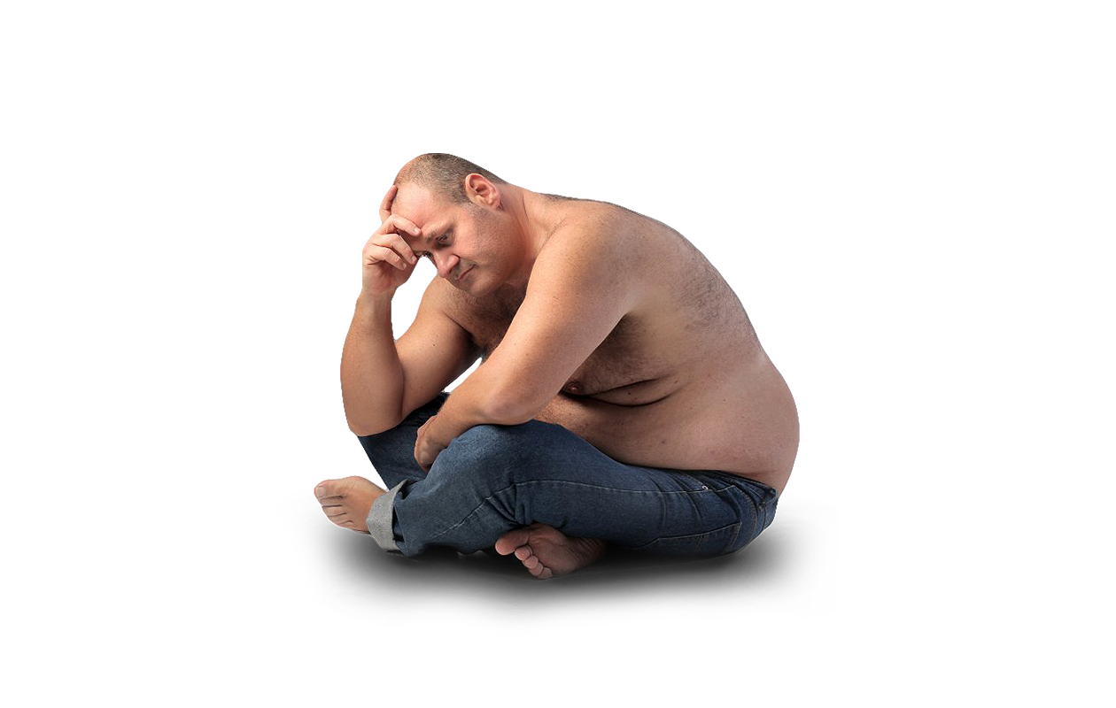 Overweight man sitting on ground looking unhappy