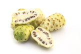 Image of fresh noni fruits with some cut in half
