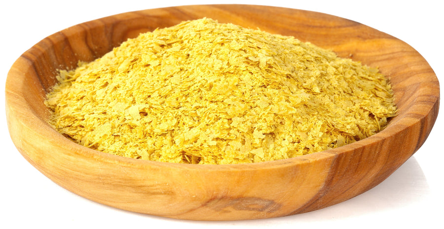 Image of Nutritional Yeast Flakes in a wooden plate