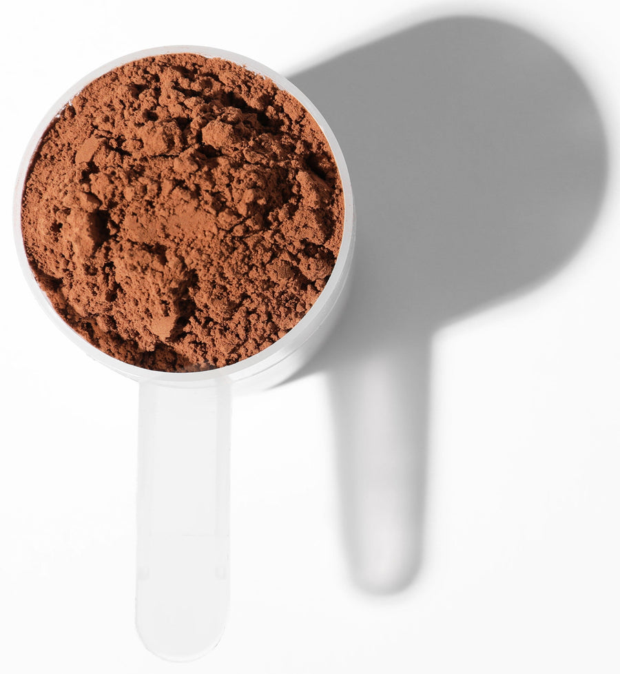Image of Optimum 30 Chocolate Whey Meal Replacement - Organic in a plastic scoop