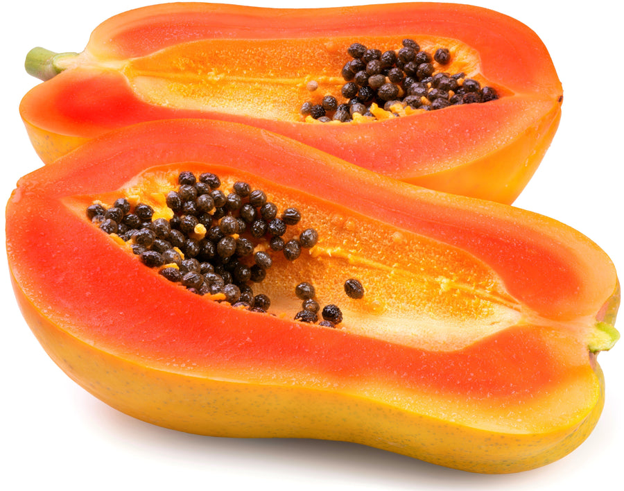 Image of halved Papaya with most of the black seeds removed on white background
