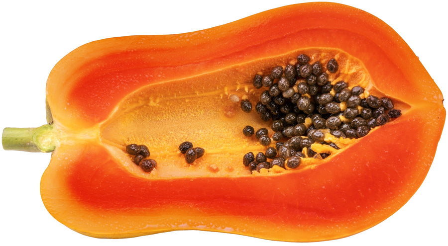 Image of one halved Papaya with most of the black seeds removed on white background.