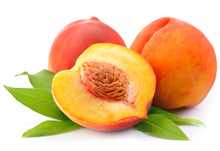 Image of a couple whole and sliced peaches