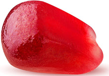 Close up image of a red pomegranate seed