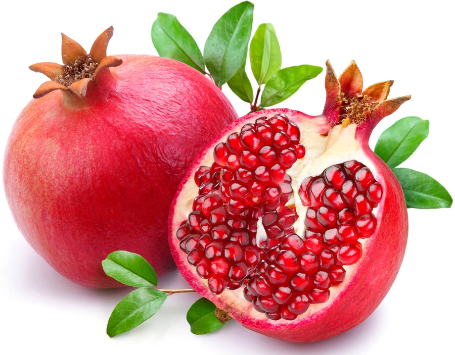 Image of a whole pomegranate and half a pomegranate