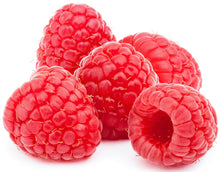 Image of five cored Raspberries on white background.