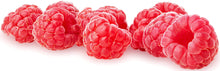 Closeup image of several cored Raspberries on white background.