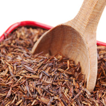 Image of Rooibos Tea (Red) shreds in a wooden spoon
