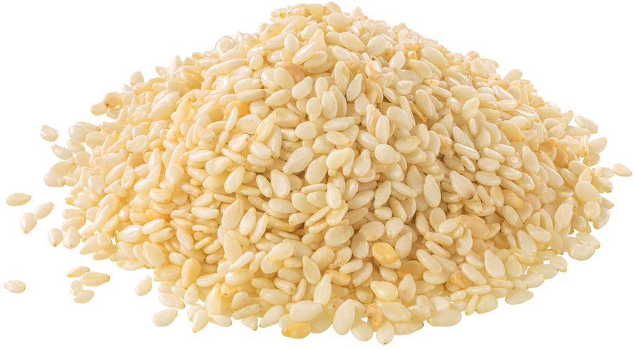 Closeup image of hulled Sesame Seeds on white background