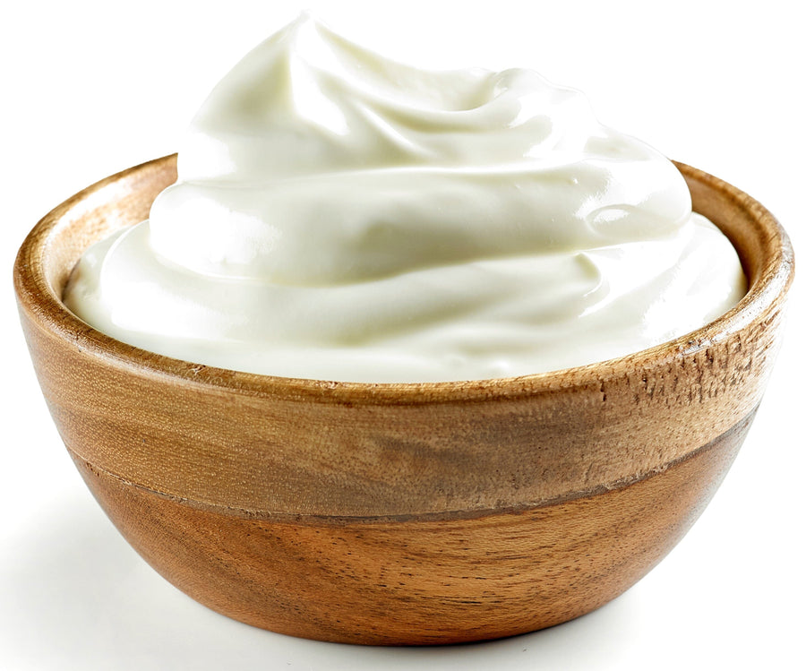 Sour Cream in a wooden bowl
