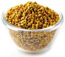 Image of Spanish Bee Pollen in clear glass bowl on white background.
