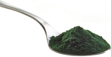 Image of Spirulina Powder - Organic on silver tablespoon on white background.
