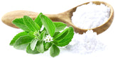 Image of Stevia Extract Powder in wooden spoon with actual stevia stem with leaves and flowers in front.