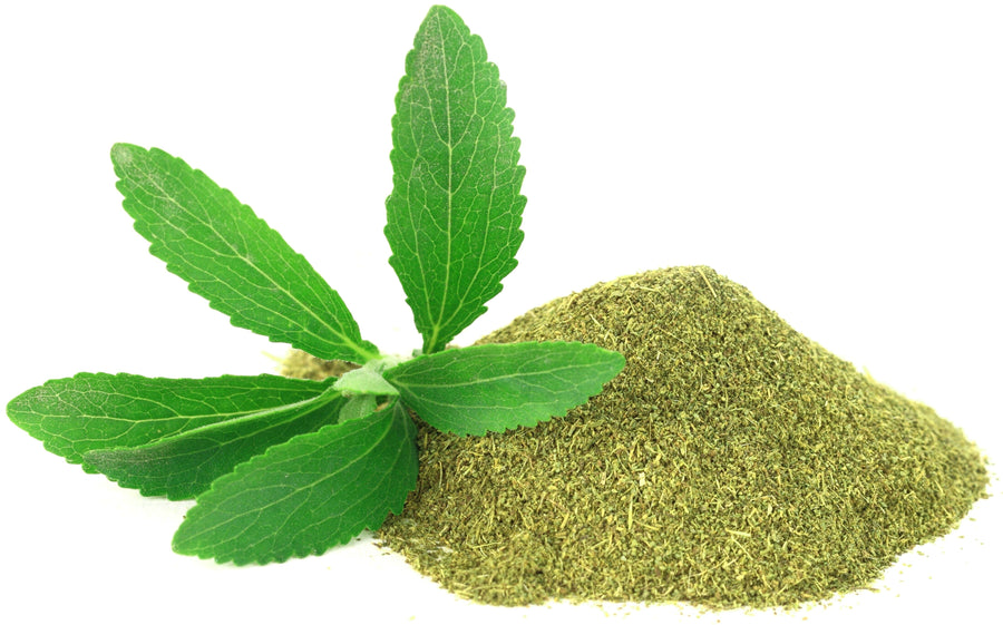 Image of fresh green Stevia Leaf and stevia leaf powder in a pile