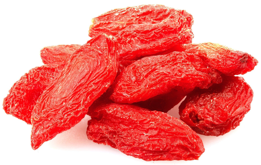 Close up image of Sun Dried Goji Berries on white background.