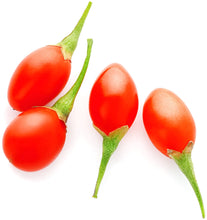 Image of four raw Goji Berries on white background.